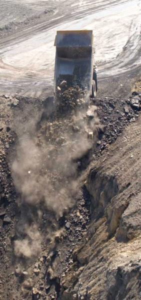 rock truck dumping mining waste in Perry County