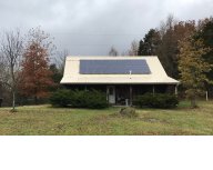A home with solar panels on its roof