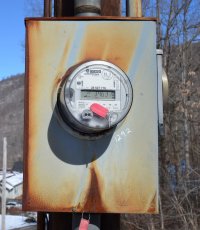 An electric meter in the winter