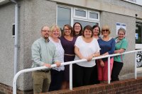 From left: After Coal director Tom Hansel, DOVE Workshop Coordinator Lesley Smith, Tanya Turner, Elizabeth Sanders, and DOVE Workshop staff at the former coal board office turned women's education hub in Banwen, Neath, July 2015.